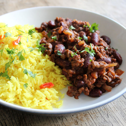 Beef & black bean chilli with rice on a plate made with a Case for Cooking spice kit